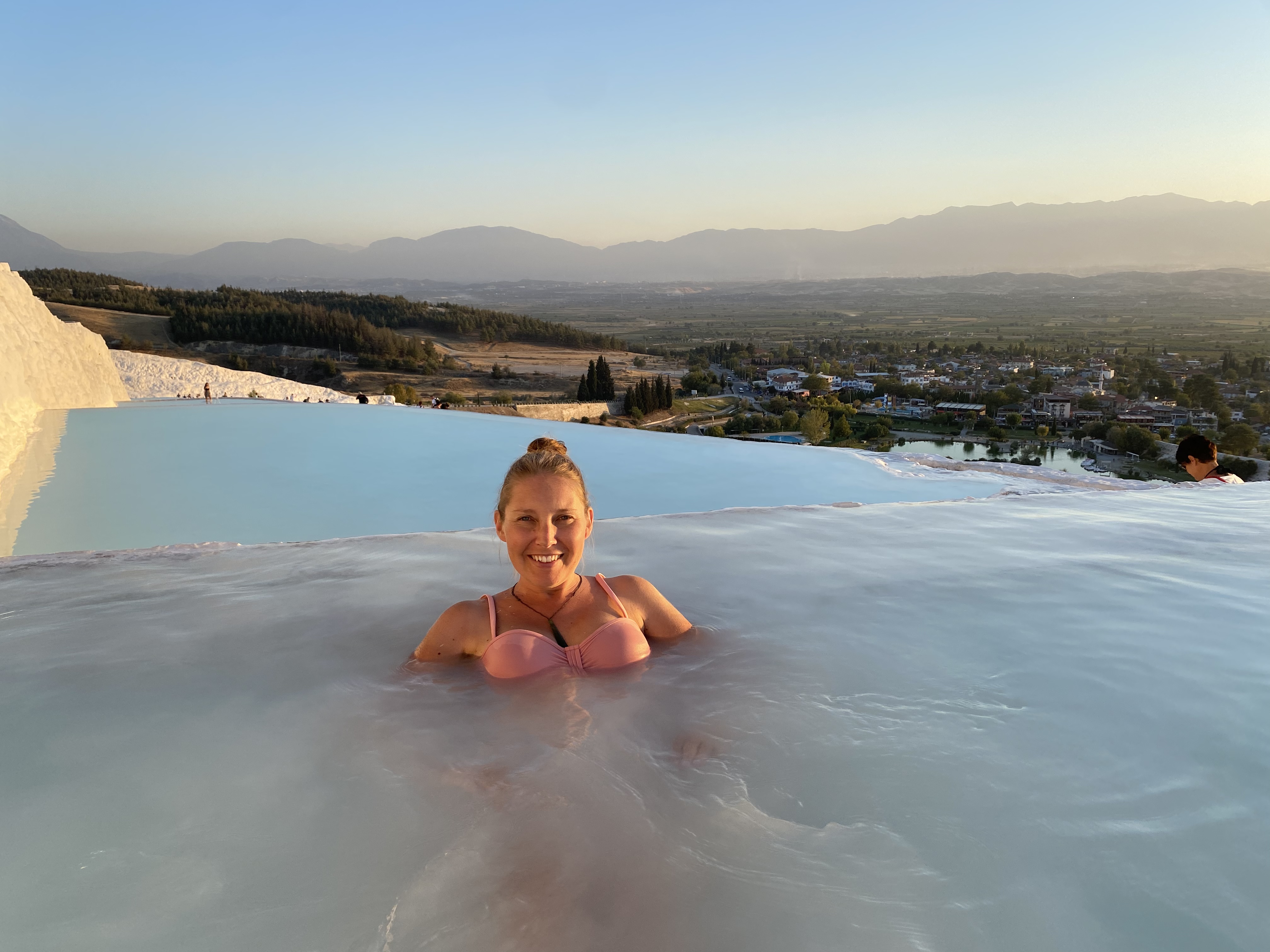 Melissa Wiringi swimming in the Pamukkale thermal pools at sunset